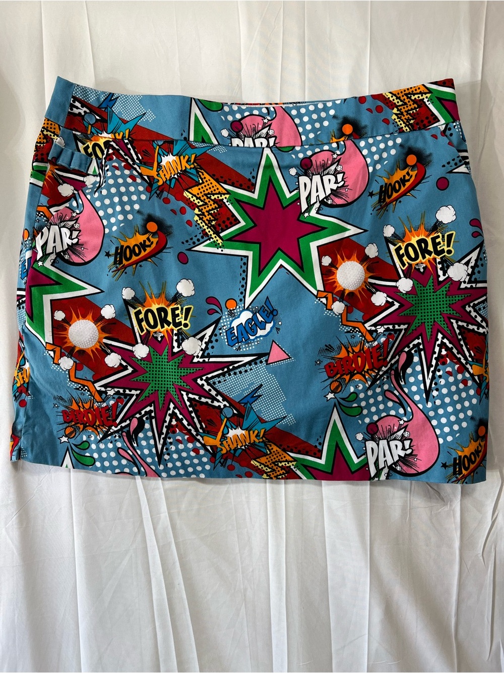 Graphic Pop-Star Blue Mini Skirt with Pink & Green Accents. Golf attire.